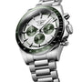 The Longines Conquest Chronograph features a stainless steel case, green bezel and subdials, silver dial, metal bracelet, and precise self-winding movement.