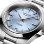 Close-up of the Longines Conquest, showcasing its automatic movement, light blue dial, silver hands and markers, date at 6 oclock, and stainless steel bracelet.