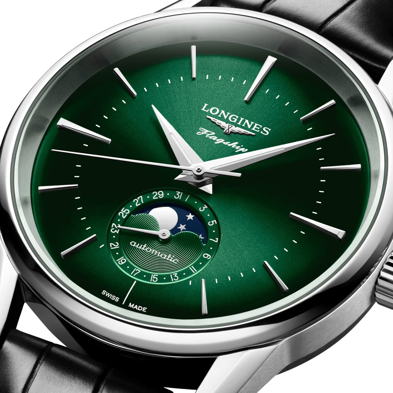 The Longines Flagship Heritage Moonphase is a green wristwatch featuring silver markers, a moonphase subdial, and a black leather strap.