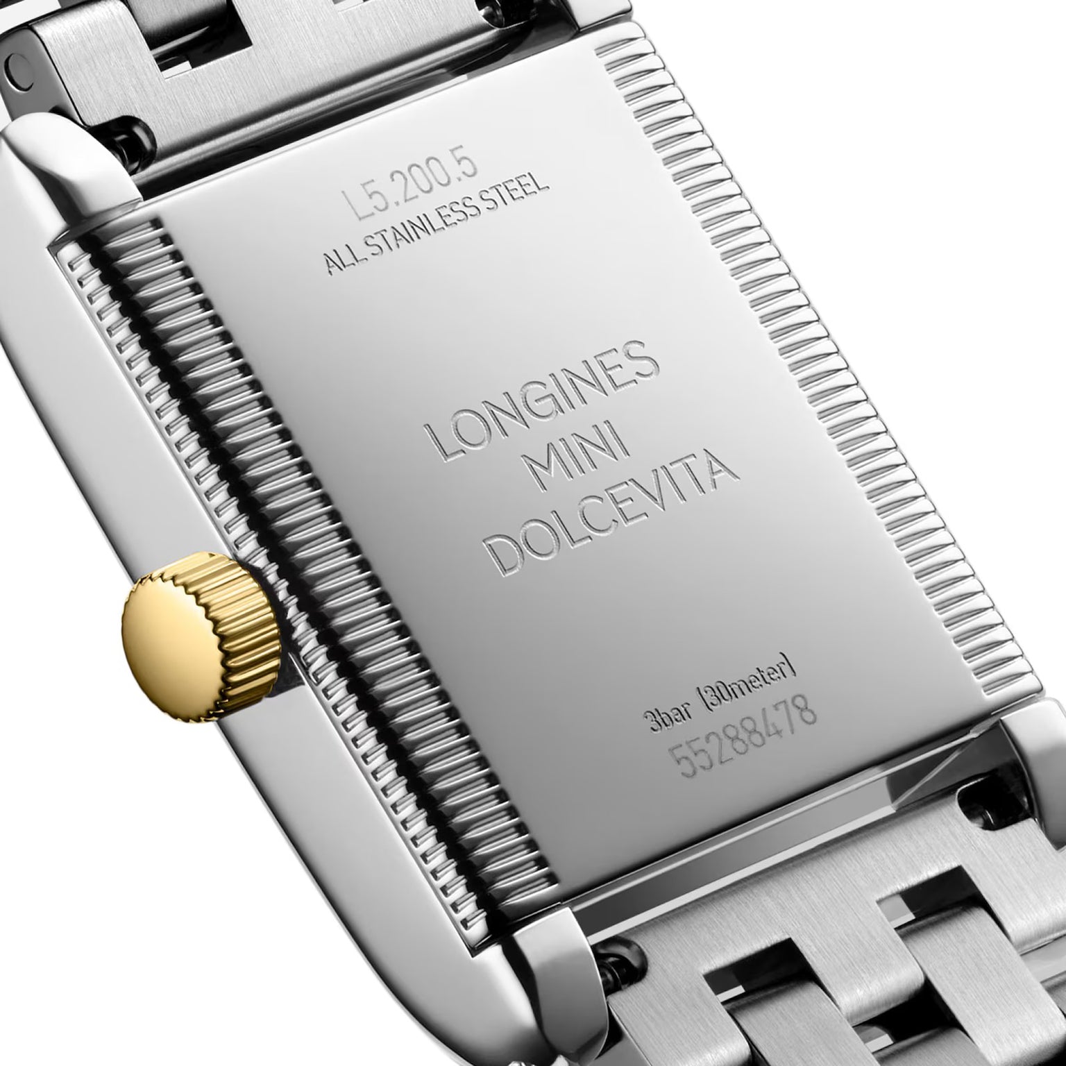 Close-up of the back of a Longines Mini DolceVita, highlighting engraved details, a sleek gold crown, and the watch’s modern elegance.