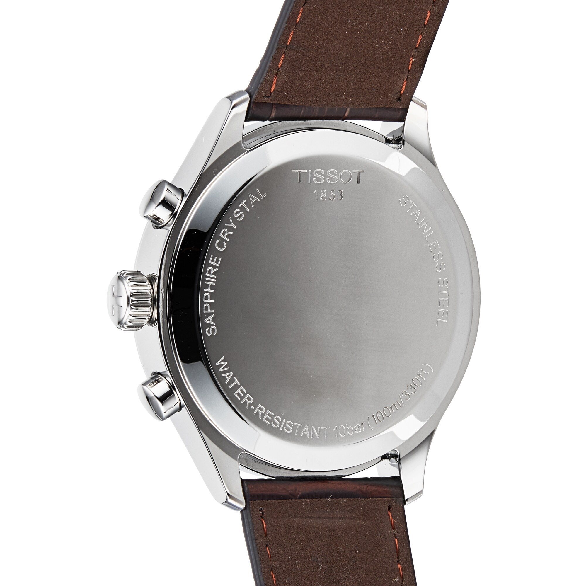 Back view of the Tissot Chrono XL Classic, featuring a brown leather strap and stainless steel case back engraved with specs like sapphire crystal and water resistance—ideal for luxury watch enthusiasts.