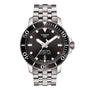 Tissot Seastar 1000 Powermatic 80 watch featuring a silver metal link band, black bezel and dial, and date display.