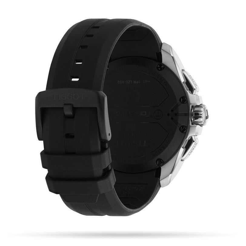 The back of a Tissot T-Touch Connect Solar watch, featuring a black rubber strap and a stainless steel case.