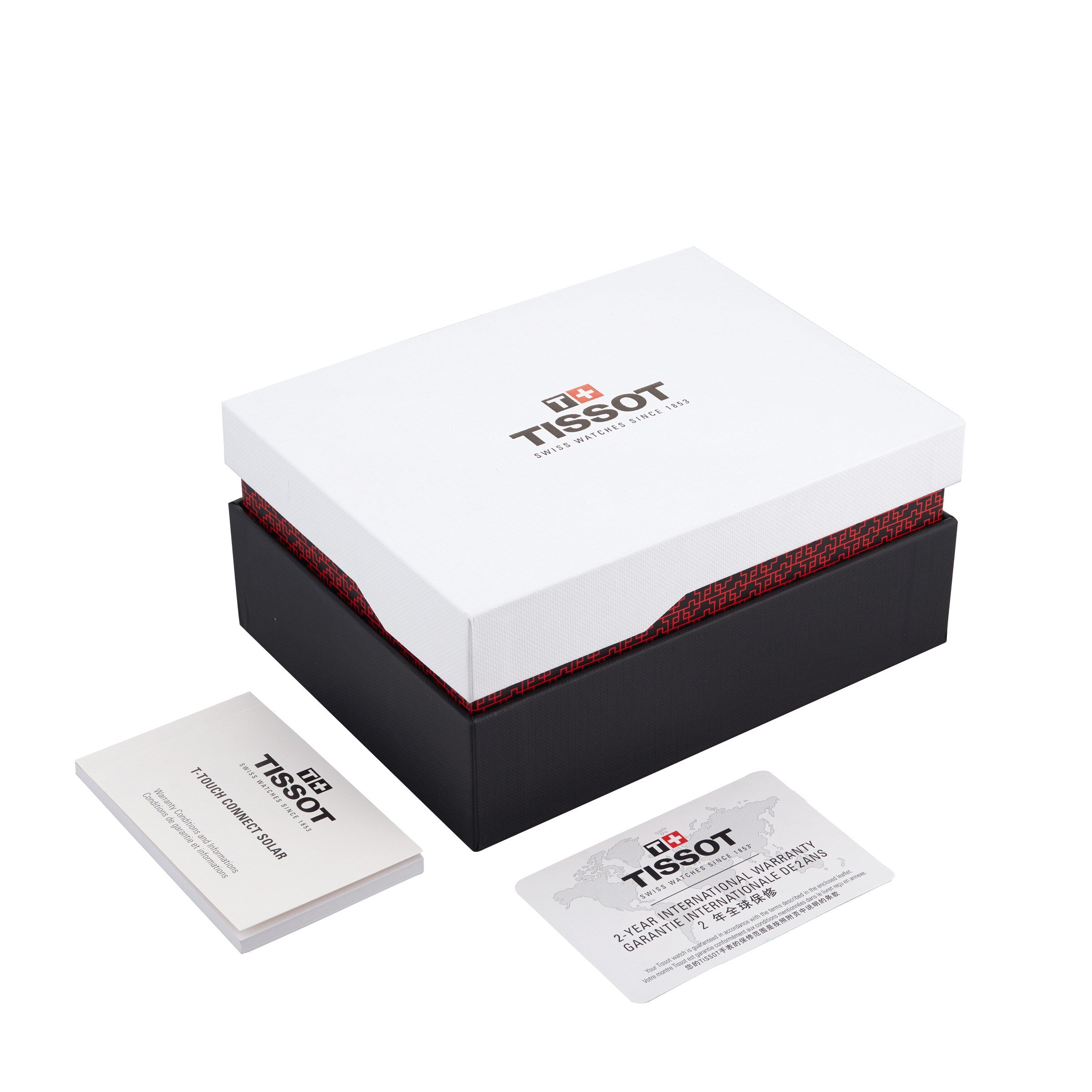 A Tissot T-Touch Connect Solar watch box with a booklet and warranty card beside it, all displayed on a white background.