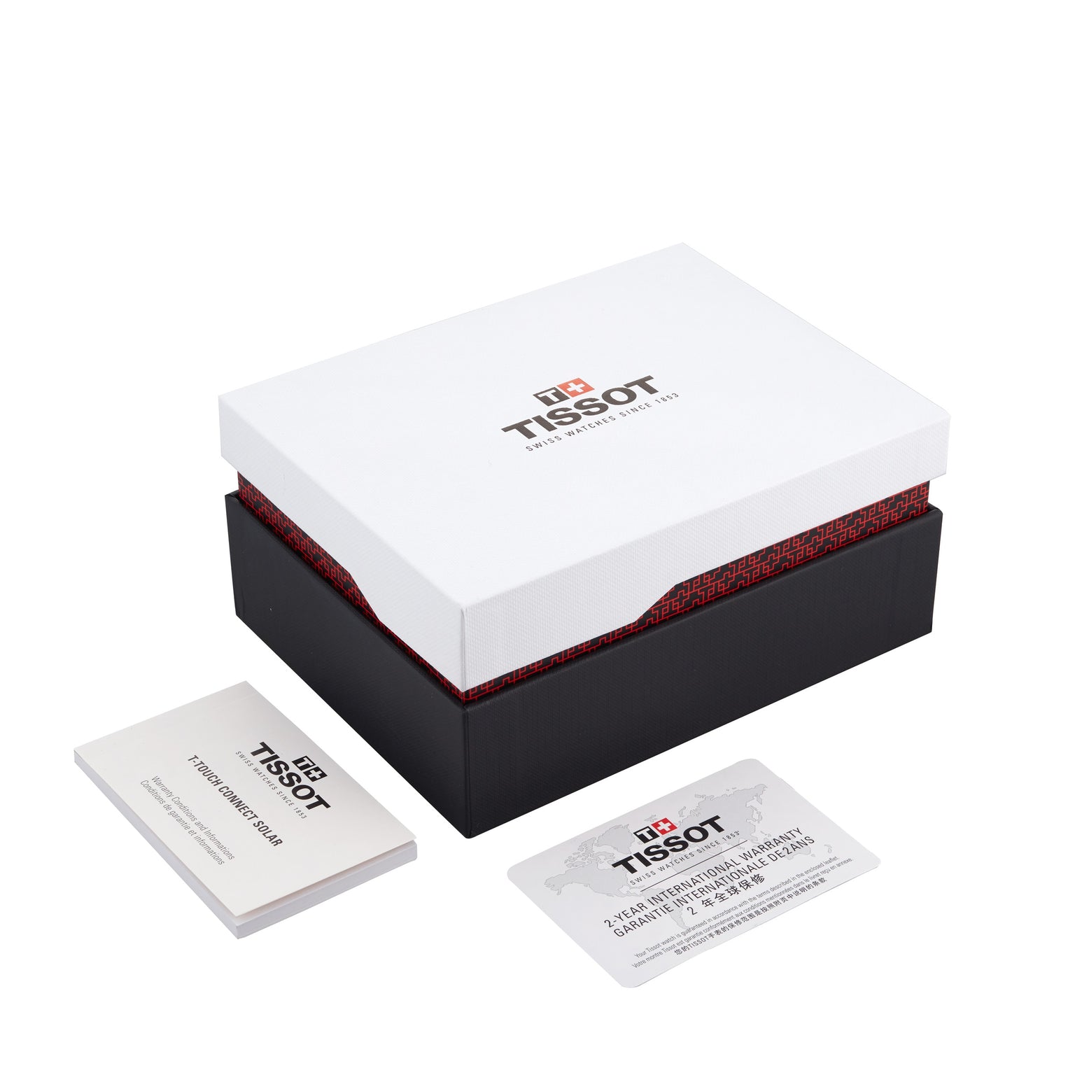 A Tissot T-Touch Connect Solar watch box in white and black, shown with a user manual and international warranty card, designed specifically for the T-Touch Connect Solar’s solar-powered reserve.