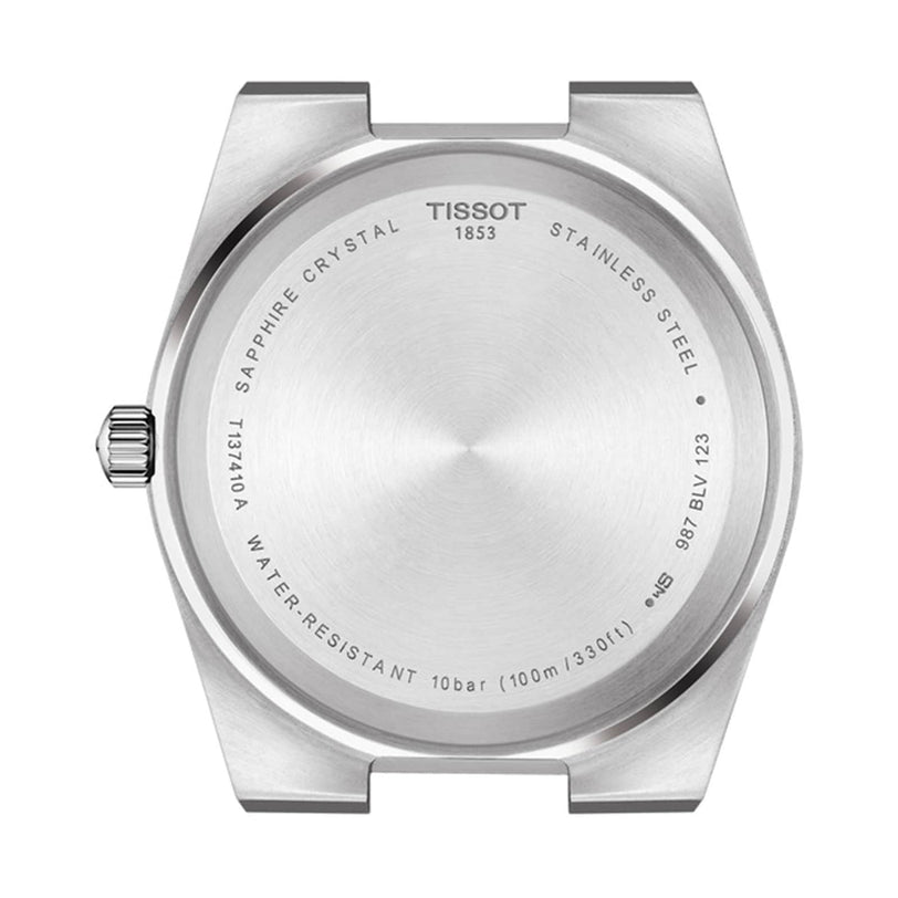Back of a Tissot PRX stainless steel case engraved with brand name, model number, water resistance details, sapphire crystal info, and Swiss quartz movement information.