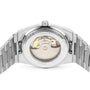 Close-up of the Tissot PRX Powermatic 80’s transparent case back, revealing its automatic movement and metal bracelet.