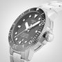 Close-up of the Tissot Seastar 1000 Powermatic 80, a stainless steel diver’s watch with black bezel and dial, white hour markers, date display at 6 oclock, and powered by the Powermatic 80 movement.