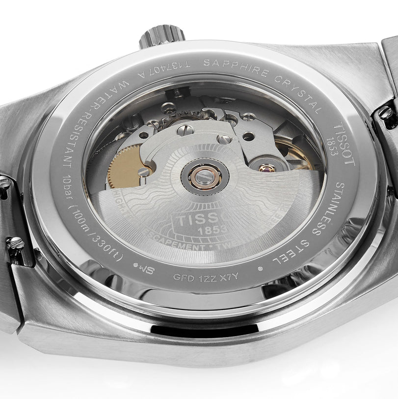 Close-up of the back of the Tissot PRX Powermatic 80 watch, showcasing its Powermatic 80 movement and sapphire crystal case back.
