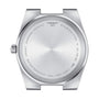 The back of the Tissot PRX watch case shows the brand name, water resistance, model and serial numbers, sapphire crystal label, and emphasizes its Swiss quartz movement.