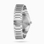 The Tissot PRX wristwatch is shown from the back, highlighting its stainless steel bracelet, clasp engraved with “1853,” and closed case back—a classic design with precise Swiss quartz movement.