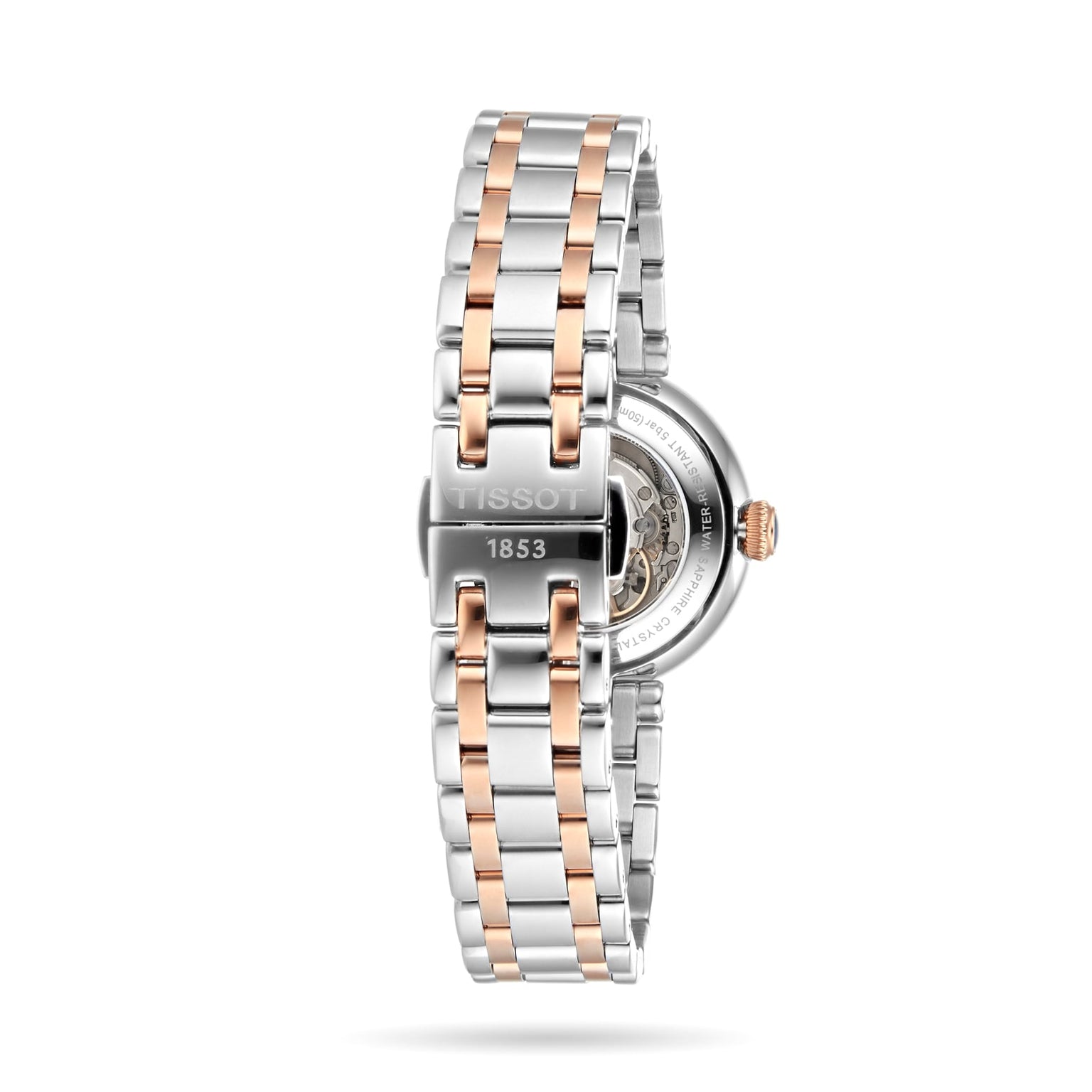 A silver and rose gold Tissot Bellissima Automatic wristwatch is shown from the back, featuring the brand name and 1853 on the clasp—an exquisite display of luxury and style from Tissot.