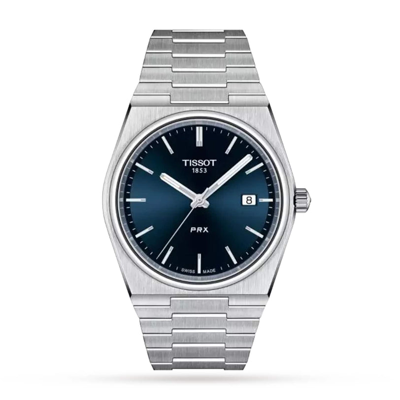 A Tissot PRX wristwatch in silver with a blue dial, date window, and metal bracelet displayed against a white background.