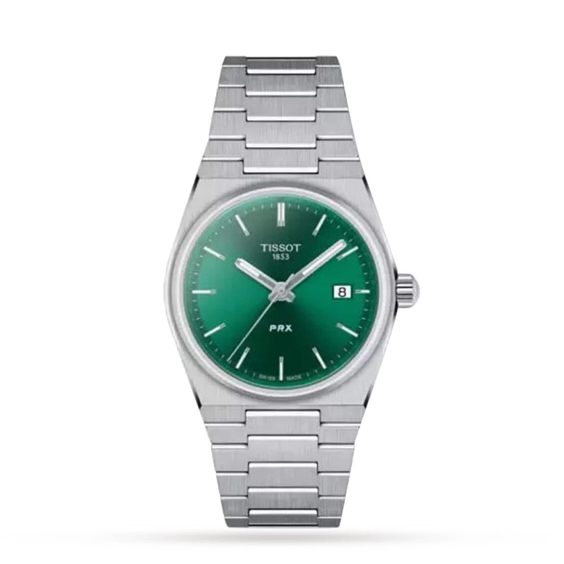 The Tissot PRX is a stainless steel wristwatch featuring a green dial, Swiss quartz movement, date display at 3 oclock, and a silver metal bracelet, displayed on a white background.