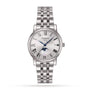 The Tissot Carson Premium Moonphase features Roman numerals, Swiss quartz movement, a moonphase display, date window at 3 oclock, and a metal link bracelet, shown on a white background.