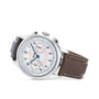The Tissot Telemeter 1938 wristwatch features a white dial with blue and red details, three subdials, and a brown leather strap—capturing a refined vintage look from the iconic collection.