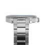 Side view of the Tissot Seastar 1000 divers watch in silver, featuring a ridged bezel, crown, and polished metal bracelet; designed for water resistance.