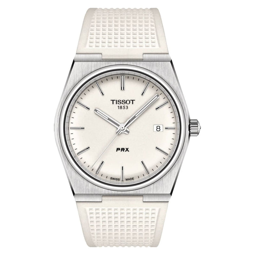 The Tissot PRX is a 40mm vintage-style wristwatch with a silver case, white textured strap, and white dial with silver hour markers, hands, and a date window at 3 oclock—offering timeless elegance.