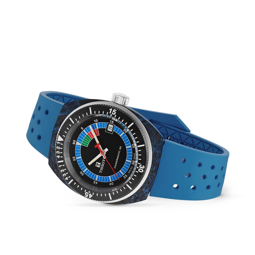 The Tissot Sideral S Powermatic 80 wristwatch features a black dial with colorful accents and a blue perforated strap, displayed against a white background.