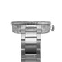 Side view of a Tissot Seastar 1000 Powermatic 80 automatic watch with a stainless steel link band and ridged bezel, featuring Super-LumiNova® accents, photographed against a white background.