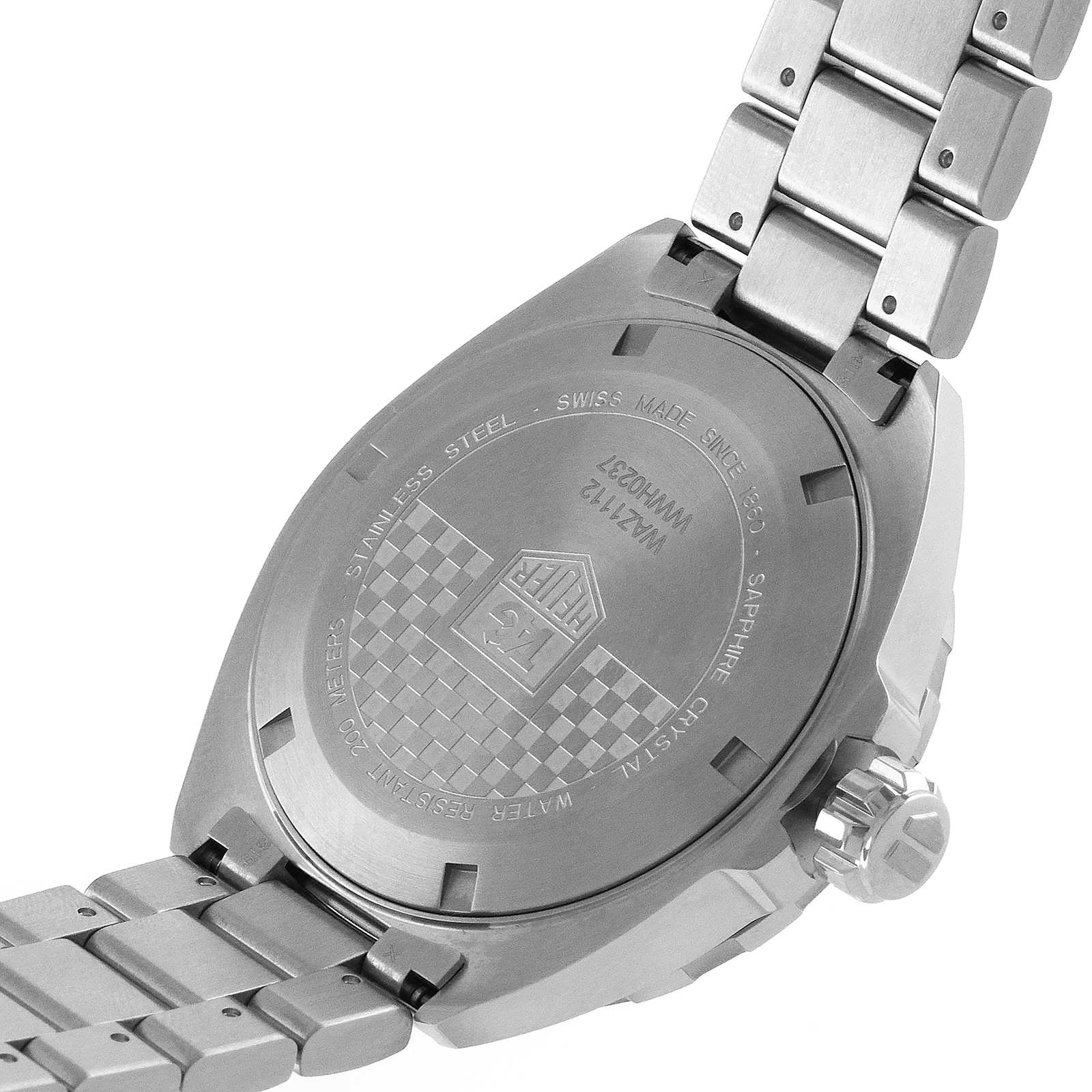 Close-up of the back of a TAG Heuer Formula 1 Date, featuring engraved details and a stainless steel bracelet, with precise quartz movement.
