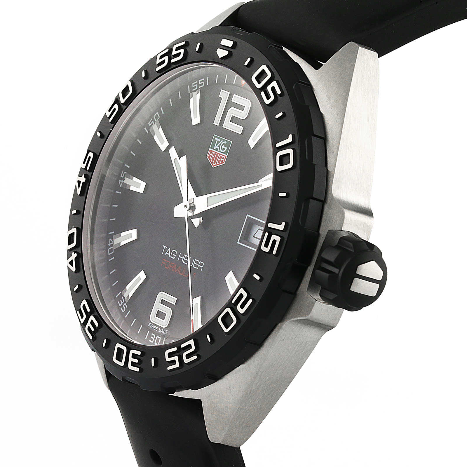 The TAG Heuer Formula 1 Date wristwatch features a black dial with silver hour markers, a date display, black bezel, black rubber strap, and precise quartz movement.