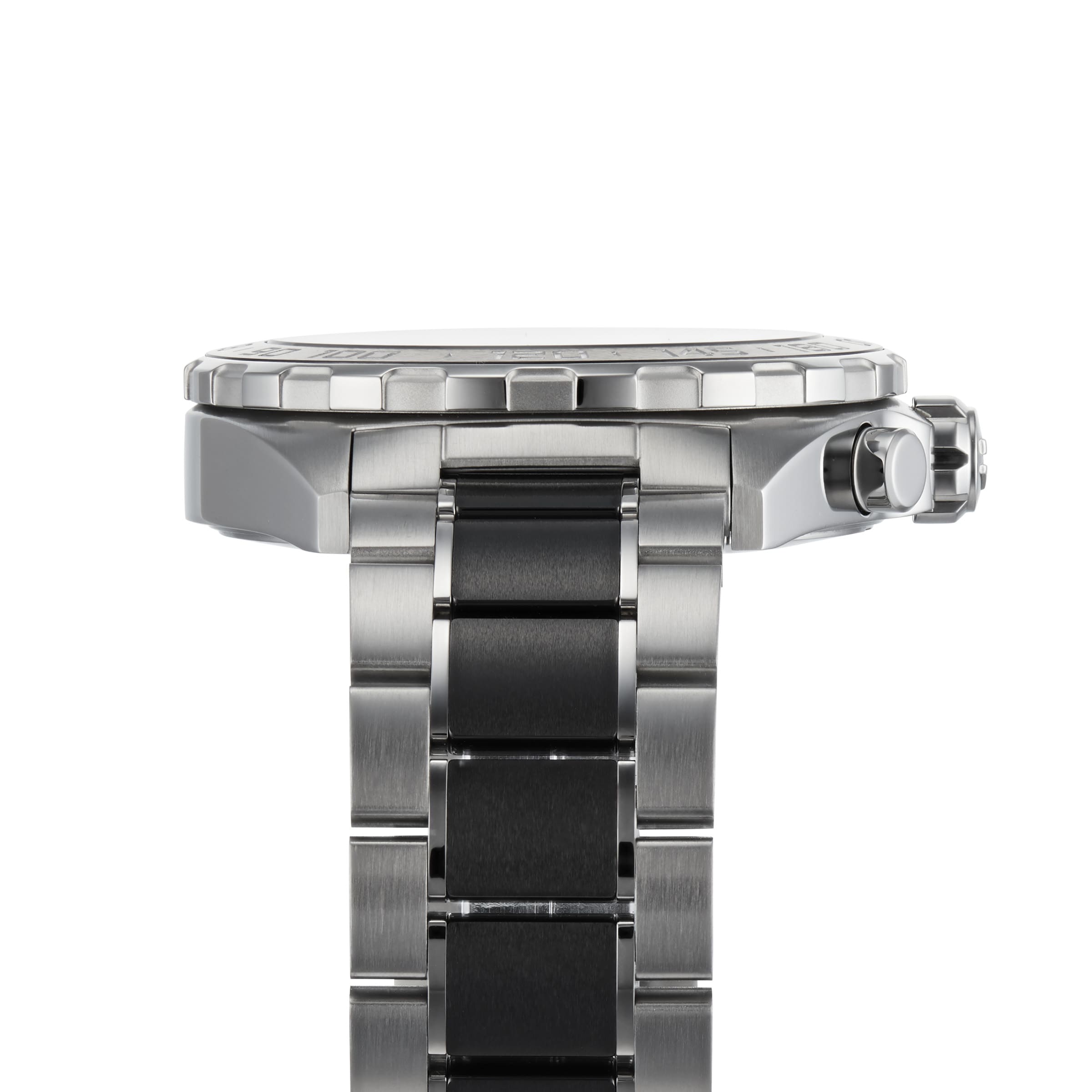 Side view of a TAG Heuer Formula 1 Chronograph stainless steel wristwatch with metal bracelet, visible bezel, and crown, highlighting its motor-racing inspired design against a white background.
