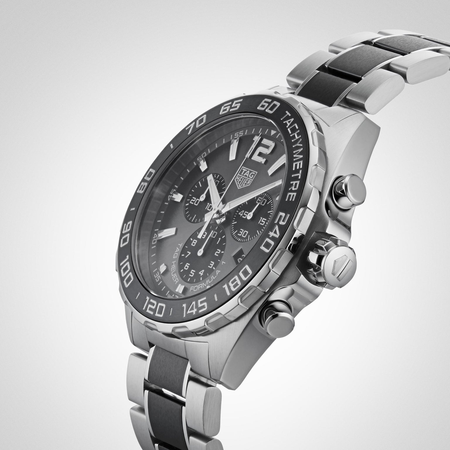 A close-up of the TAG Heuer Formula 1 Chronograph, featuring a black dial, three subdials, and a tachymeter bezel that highlights its motorsport-inspired design.