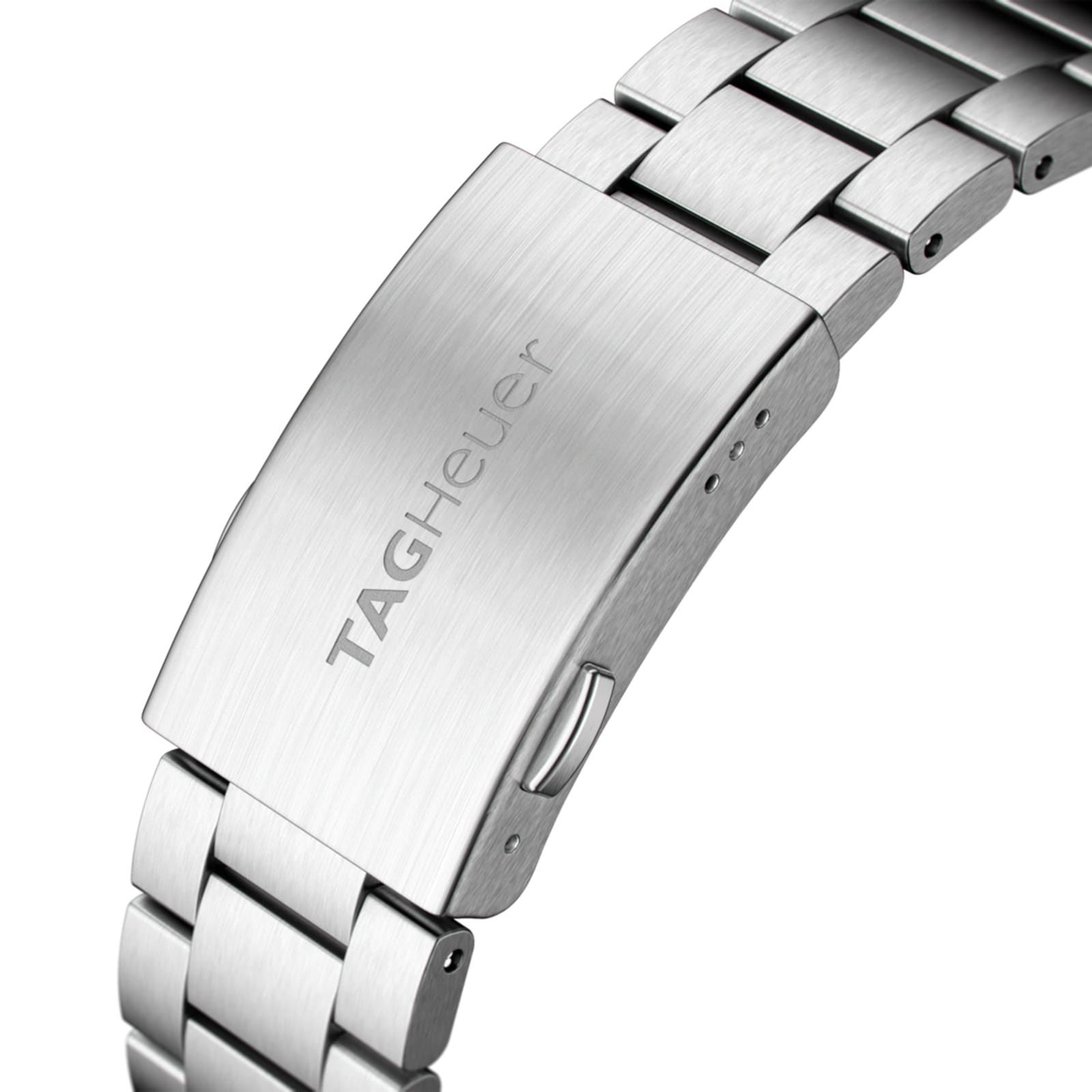 Close-up of a brushed stainless steel TAG Heuer Formula 1 Chronograph watch clasp with engraved logo and linked bracelet, showcasing the collection’s signature precision craftsmanship.
