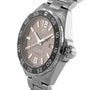 The TAG Heuer Formula 1 Date is a stainless steel wristwatch with a tachymeter bezel, grey dial, date display, automatic movement, and metal bracelet.