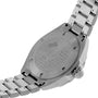 Close-up of the back of a TAG Heuer Formula 1 Date wristwatch, featuring engraved branding, model details, automatic movement information, and water resistance specifications.