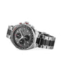 The TAG Heuer Formula 1 Chronograph features a stainless steel case, black bezel, three subdials, calibre 16 movement, date window, and a two-tone metal strap, shown on a white background.