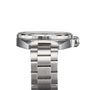 Side view of the TAG Heuer Formula 1 Date watch, featuring a stainless steel link bracelet, raised bezel, visible crown, and sleek brushed finish.
