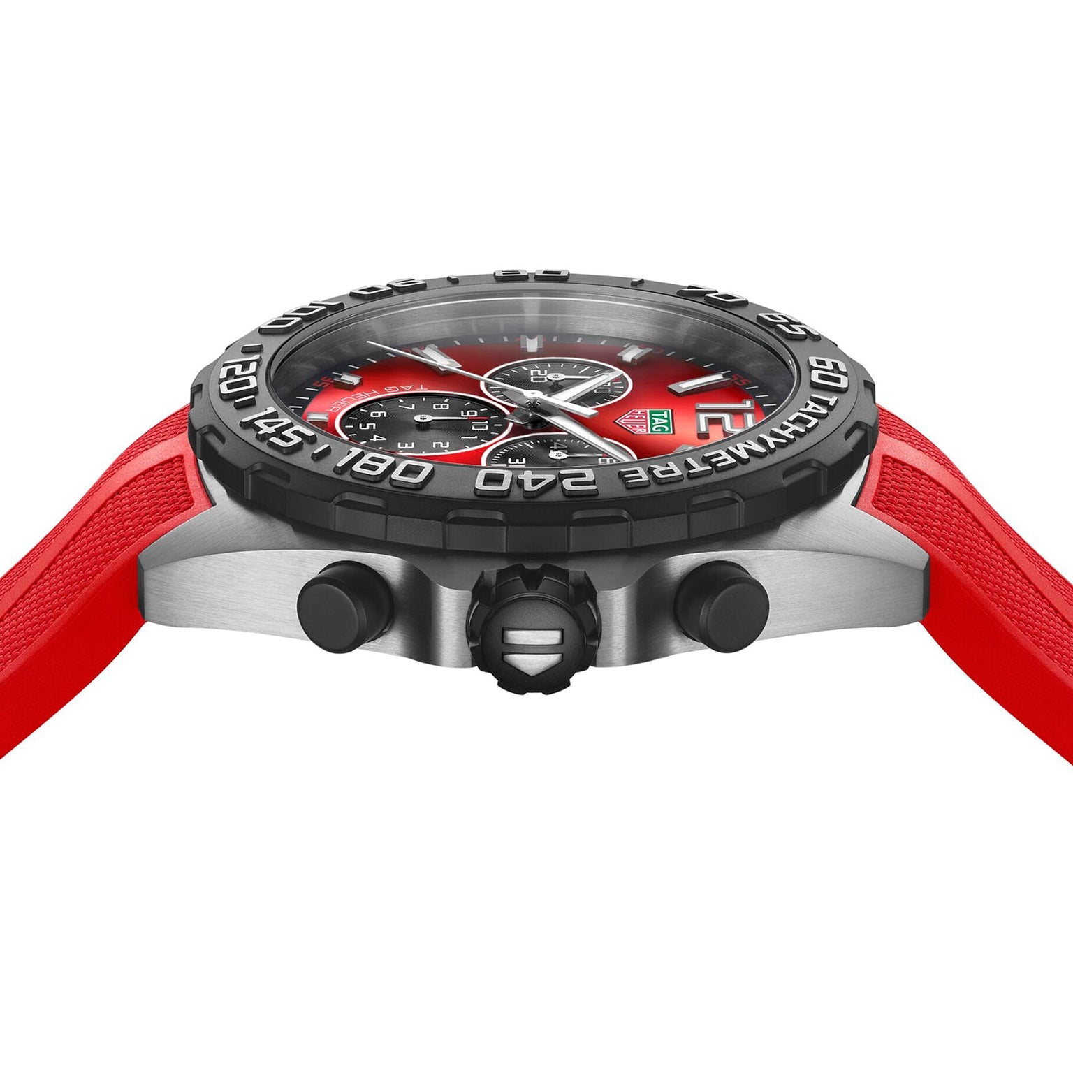 A close-up side view of the TAG Heuer Formula 1 Chronograph, showcasing its stainless steel case, red strap, black bezel, and red dial with chronograph subdials.