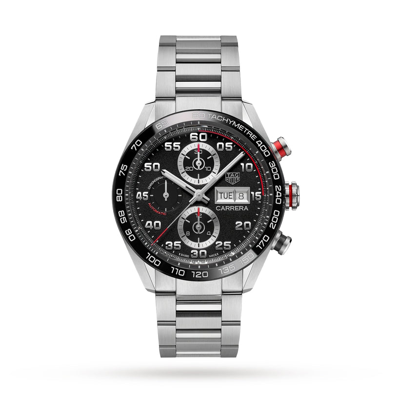 The TAG Heuer Carrera Chronograph is a stainless steel wristwatch with a black dial, three subdials, ceramic bezel, day-date display, automatic Calibre 16 movement, and metal link bracelet, displayed on a white background.