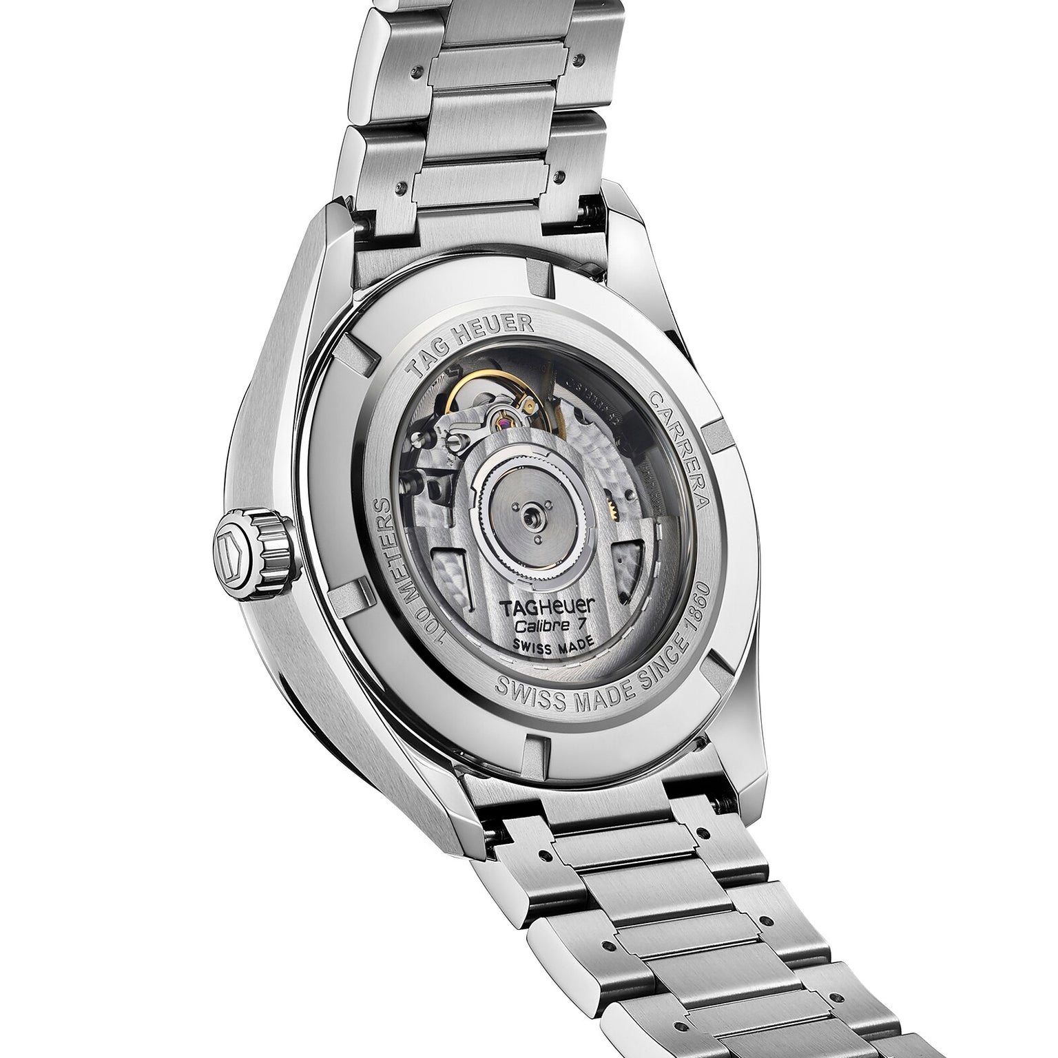 A close-up of the back of the TAG Heuer Carrera Twin-Time watch, showcasing its transparent case back and visible automatic movement with engraved TAG Heuer branding.