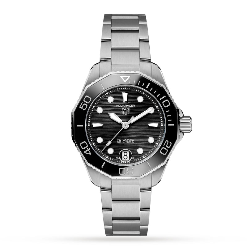 The TAG Heuer Aquaracer Professional 300 Date features a stainless steel case, black dial, silver hour markers, black bezel, and a date window at 6 o’clock, shown on a white background.