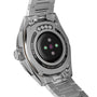 Close-up of the TAG Heuer Connected Calibre E4 smartwatchs back, highlighting its sensors, sapphire crystal marking, and stainless steel bracelet.