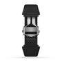 Black perforated rubber strap with stainless steel TAG Heuer deployment clasp for the Connected Calibre E4 smartwatch, shown from the back on a white background.