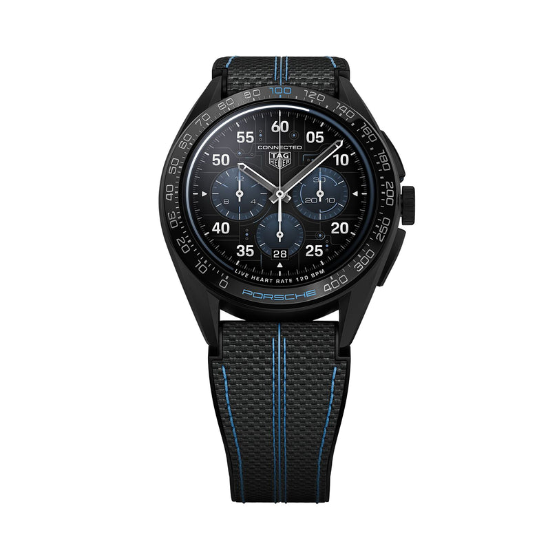 The TAG Heuer Connected Calibre E4 Porsche Edition is a black luxury smartwatch with blue accents, three subdials, a black bezel, and a textured black strap with blue stitching. The watch face features exclusive Porsche edition branding.