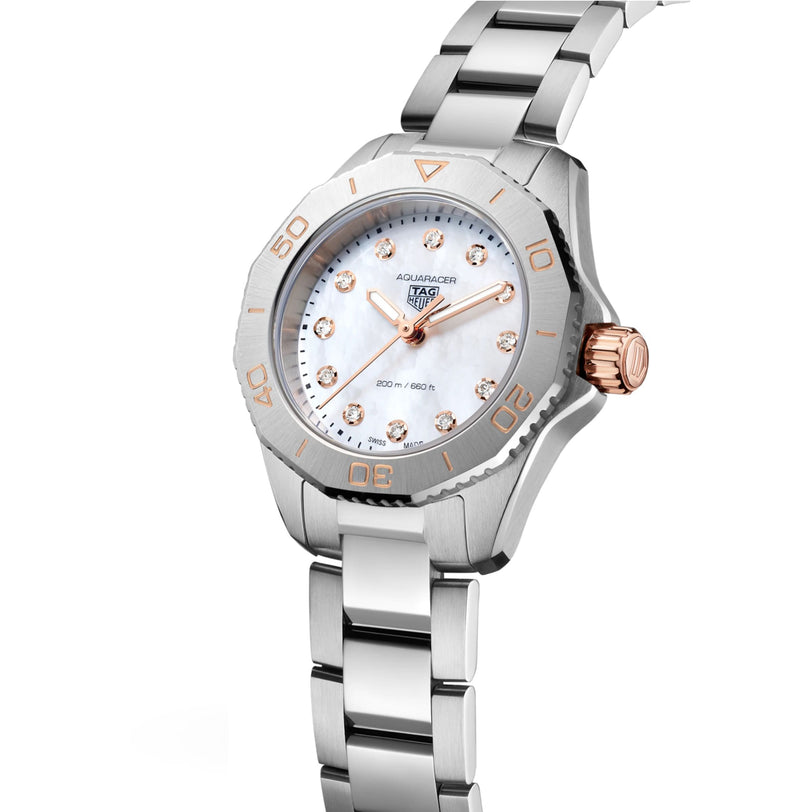 The TAG Heuer Aquaracer Professional 200, featuring a stainless steel case, mother-of-pearl dial, diamond hour markers, and a rose gold crown, is shown against a plain white background.