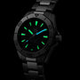 The TAG Heuer Aquaracer Professional 200 Date features a black dial with green and blue luminescent hour markers and hands, complemented by a bold stainless steel case.