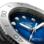 Close-up of a TAG Heuer Aquaracer Professional 200 Date watch with a blue dial, diamond hour markers, and Automatic 200 m / 660 ft text, all set in a sleek stainless steel case.