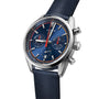 The TAG Heuer Carrera Chronograph features a blue dial with three subdials, date display, blue leather strap, and is powered by the Calibre Heuer 02 movement.