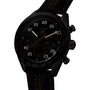 The TAG Heuer Special Edition Carrera Chronograph x Porsche Orange Racing features a black bezel, orange accents, textured black strap, multiple subdials, and a tachymeter scale.