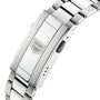 Close-up of the silver metal bracelet and geometric clasp logo on the TAG Heuer Aquaracer Professional 200 Chronograph.