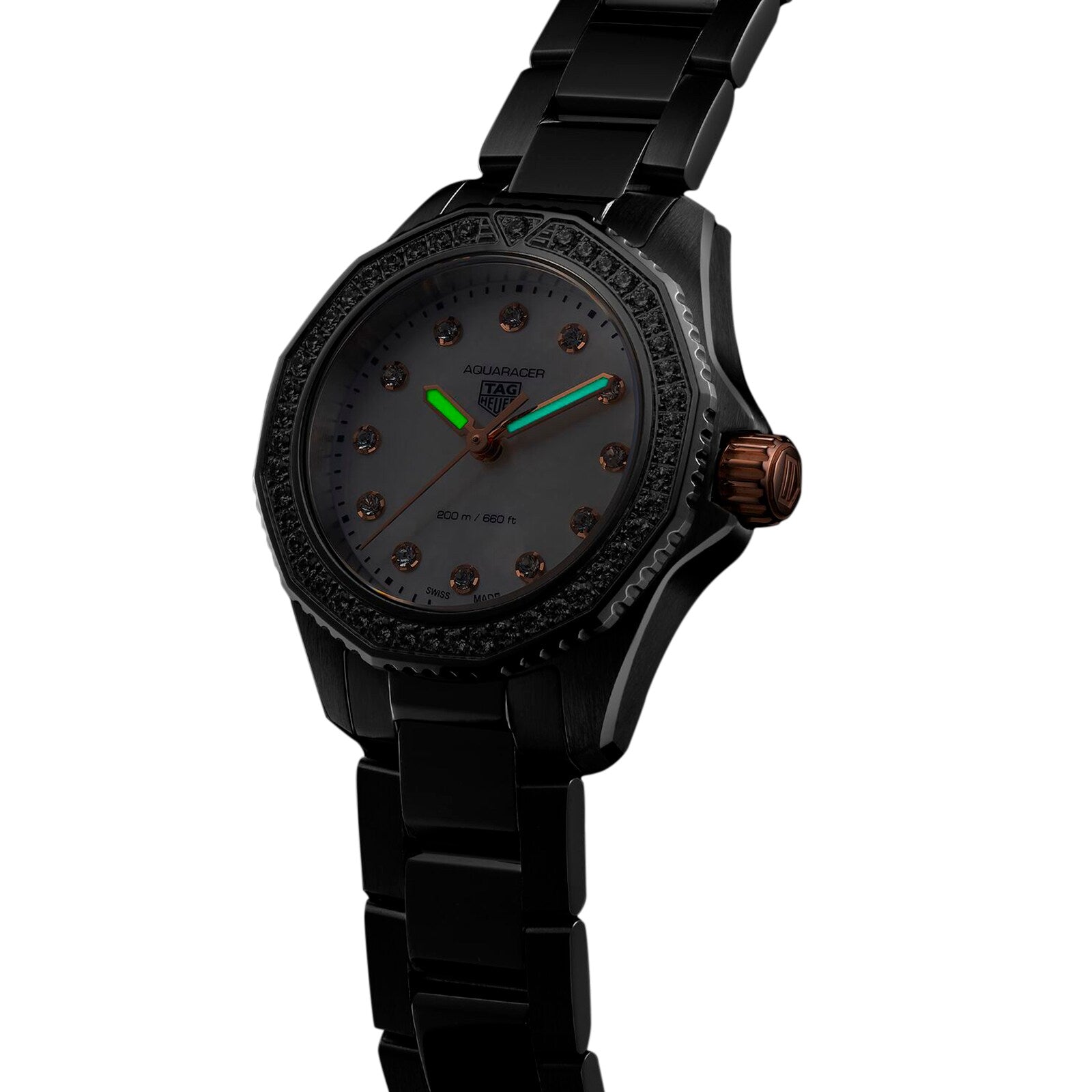 The TAG Heuer Aquaracer Professional 200 is a black wristwatch featuring a diamond-set bezel, dark face, green and yellow hands, brown crown, gemstone hour markers, and a sleek black metal bracelet.