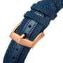 Close-up of a blue textured strap with a rose gold buckle on the TAG Heuer Carrera Chronograph Skipper, reflecting the brand’s sailing legacy.