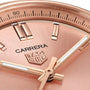 Close-up of a TAG Heuer Carrera Date watch, featuring a rose gold face with metallic hour markers and hands at 1:16. This elegant timepiece from the Carrera collection runs on an automatic movement.