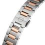 Close-up of a metal bracelet from the TAG Heuer Carrera Date, featuring alternating silver and 18ct rose gold links, with a clasp displaying the signature shield-shaped logo.